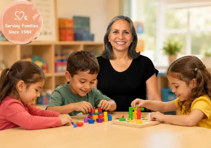 CCCDS teacher supporting children in an early learning classroom